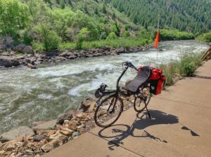 Recumbent bike next to the river in Colorado