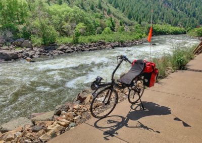 Recumbent bike next to the river in Colorado