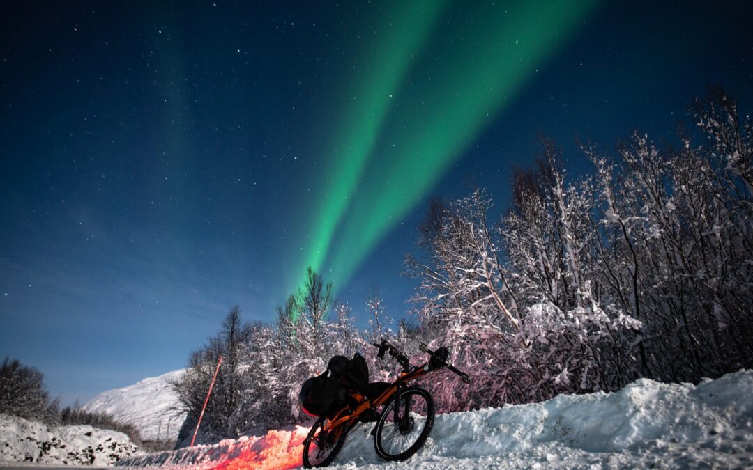 viktor zicho riding on a recumbent bike in winter in norway